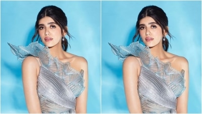 Sanjana’s silver gown featured one dramatic shoulder and a plunging neckline. The bodycon came down in multiple tiers and hugged Sanjana’s shape perfectly. (Instagram/@sanjanasanghi96) Sanjana’s silver gown featured one dramatic shoulder and a plunging neckline. The bodycon came down in multiple tiers and hugged Sanjana’s shape perfectly. (Instagram/@sanjanasanghi96)