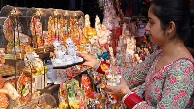 A woman holds the idols of Hindu deities ahead of the Hindu festival of Diwali at a market in Amritsar ahead of Diwali 2022. Renovate your home this festive season with these home decor ideas (Photo by Narinder NANU / AFP) A woman holds the idols of Hindu deities ahead of the Hindu festival of Diwali at a market in Amritsar ahead of Diwali 2022. Renovate your home this festive season with these home decor ideas (Photo by Narinder NANU / AFP)