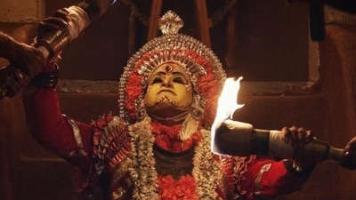 A Daiva Narthaka in a still from Rishab Shetty's Kantara. A Daiva Narthaka in a still from Rishab Shetty's Kantara.