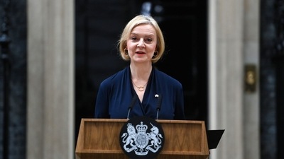 Liz Truss, UK prime minister, delivers her resignation statement outside 10 Downing Street in London, UK, on Thursday, Oct. 20, 2022. Truss�quit as UK prime minister after a brief and chaotic tenure that saw her announce a massive package of tax cuts before unwinding most of it in the face of a market rout. Source: Bloomberg (Bloomberg) Liz Truss, UK prime minister, delivers her resignation statement outside 10 Downing Street in London, UK, on Thursday, Oct. 20, 2022. Truss�quit as UK prime minister after a brief and chaotic tenure that saw her announce a massive package of tax cuts before unwinding most of it in the face of a market rout. Source: Bloomberg (Bloomberg)