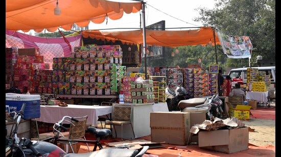 A large quantity of firecrackers has been kept in the open by vendors and a short circuit or a spark from a cracker may lead to a major mishap. (Gurpreet Singh/HT)