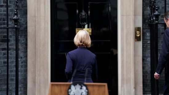 UK PM Liz Truss Resigns: Liz Truss, followed by her husband Hugh O'Leary, right, walks back into 10 Downing Street.(AP)