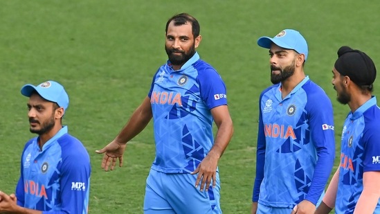 Indian players Virat Kohli, Mohammed Shami and others following their win in the ICC T20 World Cup warm-up cricket match against Australia at the Gabba in Brisbane.(PTI)