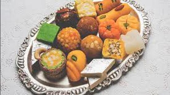 Peering through the glass display shelf, I feasted my eyes on the heaps of ‘imarti’ amid the lavish spread of sweetmeats in the shop. (HT File)
