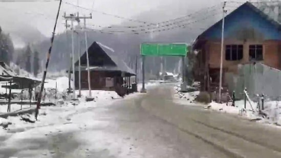 Snowfall in North Kashmir's Machil in Kupwara district. Officials also noted that weather will improve in later hours of the day and no snowfall is expected in the plains.(ANI)