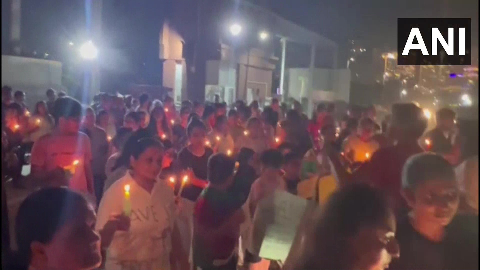 Candle march in Noida.