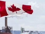 Canada Provincial Nominee Programs: A Canada flag flies in Hamilton, Ontario. Canada Provincial Nominee Programs: A Canada flag flies in Hamilton, Ontario.
