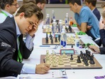 Chess World Champion Magnus Carlsen (L) during round 10 of the 44th Chess Olympiad, at Mamallapuram near Chennai Chess World Champion Magnus Carlsen (L) during round 10 of the 44th Chess Olympiad, at Mamallapuram near Chennai