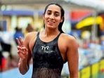 Guwahati: Swimmer Maana Patel flashes victory sign during the Women's 200m Backstroke event