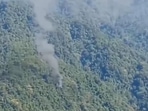 Arunachal: Smoke billows from site where military helicopter crashed in Upper Siang district of Arunachal Pradesh on Friday.