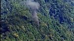 Smoke seen coming out from the accident site where an Advanced Light Helicopter (ALH) military chopper crashed near the Tuting area in the Upper Siang district of Arunachal Pradesh on Friday. (ANI) Smoke seen coming out from the accident site where an Advanced Light Helicopter (ALH) military chopper crashed near the Tuting area in the Upper Siang district of Arunachal Pradesh on Friday. (ANI)