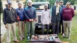 Forest department officials with the arrested poachers in the Corbett Tiger Reserve. (Sourced Photo)