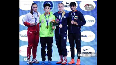 Winners of women’s wrestling championship in Spain, Ankush first from right and Manti first from left (HT Photo)