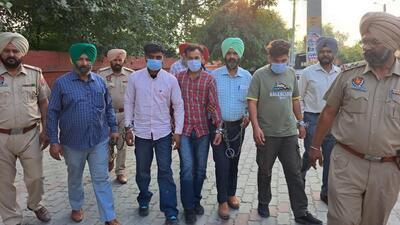 The trio -- Balraj Singh of Bhikhiwind, Atish Kumar and Avinash Kumar of Sarhali village in Tarn Taran -- were nabbed with an AK-47 rifle, three pistols and 55 rounds of ammunition during a joint operation of Delhi Police, Punjab anti-gangster task force (AGTF) and the Amritsar police commissionerate on Friday. (HT Photo) The trio -- Balraj Singh of Bhikhiwind, Atish Kumar and Avinash Kumar of Sarhali village in Tarn Taran -- were nabbed with an AK-47 rifle, three pistols and 55 rounds of ammunition during a joint operation of Delhi Police, Punjab anti-gangster task force (AGTF) and the Amritsar police commissionerate on Friday. (HT Photo)