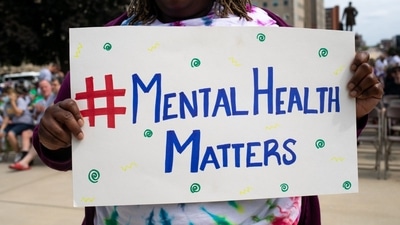 An advocate holding a sign during a 'Walk A Mile In My Shoes' rally at the Michigan State Capitol in Lansing, Michigan, US, on Thursday, Sept. 15, 2022. The rally aims to highlight the need for increased funding for mental health services, raises awareness of behavioral health needs in health and policy discussions and works to banish behavioral health stigmas. (Bloomberg/representative image) An advocate holding a sign during a 'Walk A Mile In My Shoes' rally at the Michigan State Capitol in Lansing, Michigan, US, on Thursday, Sept. 15, 2022. The rally aims to highlight the need for increased funding for mental health services, raises awareness of behavioral health needs in health and policy discussions and works to banish behavioral health stigmas. (Bloomberg/representative image)