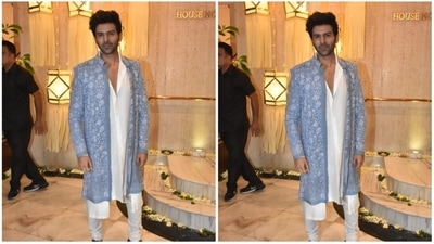 Kartik Aaryan looked dapper in his white kurta set which he paired with a blue ethnic jacket. (HT Photo/Naziyah Khan) Kartik Aaryan looked dapper in his white kurta set which he paired with a blue ethnic jacket. (HT Photo/Naziyah Khan)