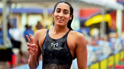 Guwahati: Swimmer Maana Patel flashes victory sign during the Women's 200m Backstroke event (PTI)
