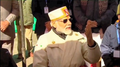 Prime Minister Narendra Modi interacts with workers engaged in development project at the Kedarnath holy site, in Rudraprayag district. (PTI/ BJP4India) Prime Minister Narendra Modi interacts with workers engaged in development project at the Kedarnath holy site, in Rudraprayag district. (PTI/ BJP4India)