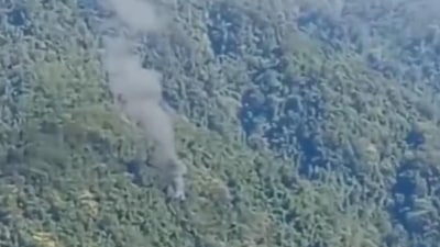 Arunachal: Smoke billows from site where military helicopter crashed in Upper Siang district of Arunachal Pradesh on Friday.