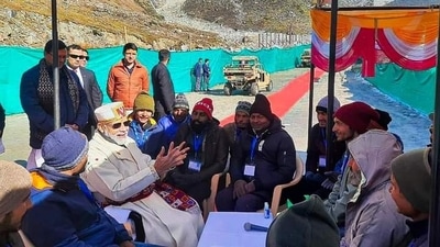 Prime Minister Narendra Modi had a free-wheeling interaction with construction workers engaged in working on various projects in Uttarkhand. (@pushkardhami/ Twitter)