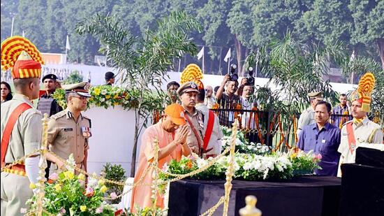 Uttar Pradesh chief minister Yogi Adityanath pays tribute to police personnel who were killed in the line of duty, on the occasion of Police Commemoration Day in Lucknow on Friday. (ANI PHOTO)