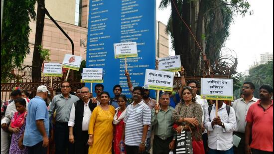 Around 50 representatives of Bombay Catholic Sabha protested outside Kokilaben Dhirubhai Ambani Hospital. (Bhushan Koyande/HT Photo)