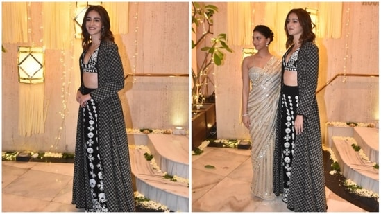 Ananya Panday opted for a black lehenga set featuring white embroidery. She completed her look with a matching cape.(HT Photo/Naziyah Khan)