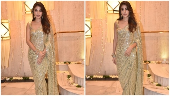 Rhea Chakraborty was spotted wearing a dazzling golden saree with minimal jewellery.(HT Photo/Naziyah Khan)