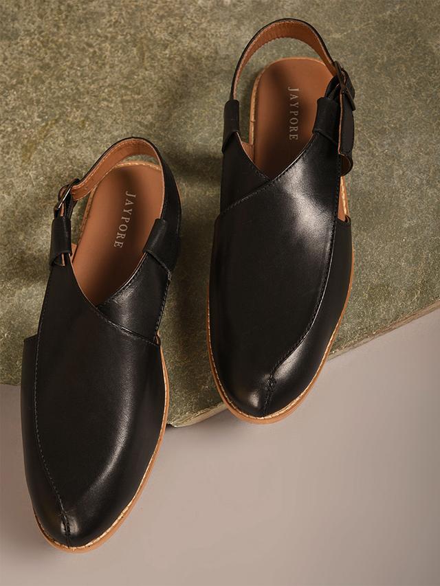 A smart pair of peshawari’s to dress your feet and complete your traditional look. (Soft, high quality, traditional leather footwear in black and brown by Jaypore) A smart pair of peshawari’s to dress your feet and complete your traditional look. (Soft, high quality, traditional leather footwear in black and brown by Jaypore)