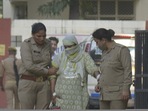 The woman accused of creating a fake kidnapping and rape case being produced in the Ghaziabad Police court. 