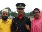 Major Mustafa Bohara with his parents.(Source: @YusufDFI) Major Mustafa Bohara with his parents.(Source: @YusufDFI)