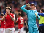 Nottingham Forest's Neco Williams, left, and Nottingham Forest goalkeeper Dean Henderson celebrate after the Premier League match between Nottingham Forest and Liverpool, at the City Ground, in Nottingham.(AP) Nottingham Forest's Neco Williams, left, and Nottingham Forest goalkeeper Dean Henderson celebrate after the Premier League match between Nottingham Forest and Liverpool, at the City Ground, in Nottingham.(AP)