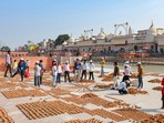 Preparations underway at Ram Ki Paidi on the banks of Sarayu River for the traditional 'Deepotsav' celebrations, in Ayodhya, Uttar Pradesh. (PTI Photo) Preparations underway at Ram Ki Paidi on the banks of Sarayu River for the traditional 'Deepotsav' celebrations, in Ayodhya, Uttar Pradesh. (PTI Photo)