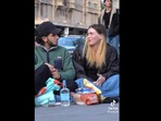 Man helps homeless woman. Man helps homeless woman.