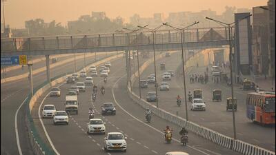 New Delhi, India - Oct. 19, 2020: Traffic plying on a haze covered NH-24 road as air pollution level is on the rise, near Akshardham Temple, in New Delhi, India, on Monday, October 19, 2020. (Photo by Raj K Raj/ Hindustan Times) (Raj K Raj/HT PHOTO) New Delhi, India - Oct. 19, 2020: Traffic plying on a haze covered NH-24 road as air pollution level is on the rise, near Akshardham Temple, in New Delhi, India, on Monday, October 19, 2020. (Photo by Raj K Raj/ Hindustan Times) (Raj K Raj/HT PHOTO)