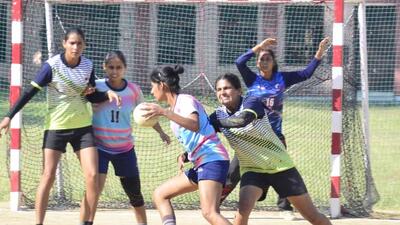 Players in action during a handball match of state-level championship being held under Punjab Khed Mela in Ludhiana. (HT PHOTO)
