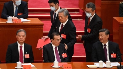 China Communist Party Meeting: Former president Hu Jintao leaves the closing ceremony of the Chinese Communist Party's Congress. (AFP) China Communist Party Meeting: Former president Hu Jintao leaves the closing ceremony of the Chinese Communist Party's Congress. (AFP)