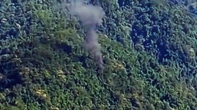 Smoke seen coming out from the accident site where an Advanced Light Helicopter (ALH) military chopper crashed near the Tuting area in the Upper Siang district of Arunachal Pradesh on Friday. (ANI) Smoke seen coming out from the accident site where an Advanced Light Helicopter (ALH) military chopper crashed near the Tuting area in the Upper Siang district of Arunachal Pradesh on Friday. (ANI)