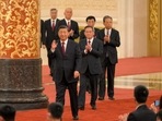 Xi Jinping: China's President Xi Jinping walks with members of the Chinese Communist Party's new Politburo Standing Committee. Xi Jinping: China's President Xi Jinping walks with members of the Chinese Communist Party's new Politburo Standing Committee.