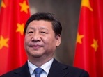 Xi Jinping: China's President Xi Jinping stands by national flags. Xi Jinping: China's President Xi Jinping stands by national flags.