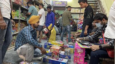 Customers taking their pick from firecrackers at the Kurali wholesale market on Diwali eve. (HT Photo) Customers taking their pick from firecrackers at the Kurali wholesale market on Diwali eve. (HT Photo)