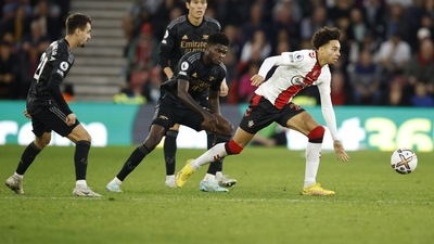 Southampton's Samuel Edozie, right, runs to take control of the ball during the English Premier League match (AP) Southampton's Samuel Edozie, right, runs to take control of the ball during the English Premier League match (AP)