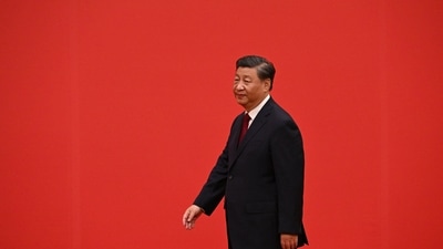 China's Xi Jinping: China's President Xi Jinping walks ahead of members of the Chinese Communist Party's new Politburo Standing Committee. (AFP)