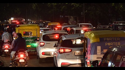 Commuters stuck in a traffic jam at Sector 18 in Chandigarh on Diwali eve on Sunday. (Keshav Singh/HT)