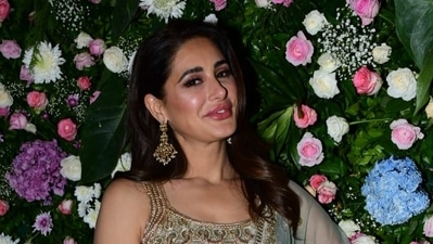 Nargis Fakhri made a rare appearance at Ekta Kapoor's Diwali party on Saturday. She was spotted in an olive green lehenga. She was last seen in Sanjay Dutt-starrer Torbaaz and is currently working on a Telugu film. (Varinder Chawla) Nargis Fakhri made a rare appearance at Ekta Kapoor's Diwali party on Saturday. She was spotted in an olive green lehenga. She was last seen in Sanjay Dutt-starrer Torbaaz and is currently working on a Telugu film. (Varinder Chawla)