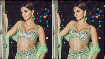Ananya paired a sequined pastel green bralette with silver resham threadwork with a long flowy skirt featuring heavy embellishment and sequin details in silver. She added a pastel green dupatta and added more festive vibes to her look. (Instagram/@ananyapanday) Ananya paired a sequined pastel green bralette with silver resham threadwork with a long flowy skirt featuring heavy embellishment and sequin details in silver. She added a pastel green dupatta and added more festive vibes to her look. (Instagram/@ananyapanday)