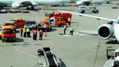 Toronto island airport evacuated in bomb scare, 2 detained (PTI) Toronto island airport evacuated in bomb scare, 2 detained (PTI)