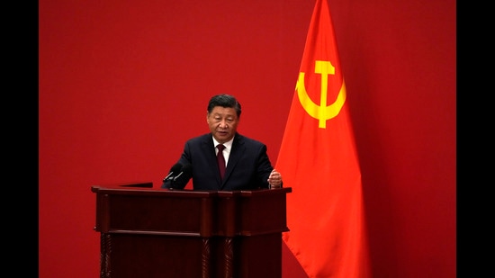 Chinese President Xi Jinping speaks at an event to introduce new members of the Politburo Standing Committee at the Great Hall of the People in Beijing on Sunday. (AP)