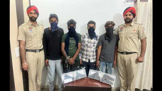 The four accused, including the two shooters who gunned down a shopkeeper in Tarn Taran on October 11, in police custody on Sunday. (HT Photo)