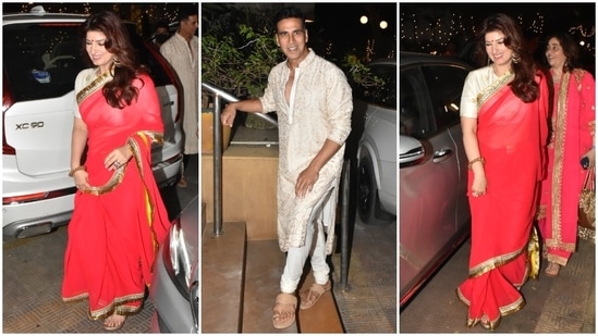 Twinkle Khanna attended Abu Jani's bash in a red georgette saree adorned with bold gota patti borders and teamed it with a silk brocade blouse. Akshay complemented her in an ivory embroidered kurta and churidar pyjama set. (HT Photo/Varinder Chawla)